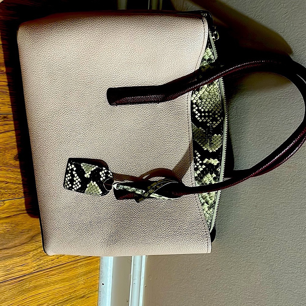 Kate Spade bag.  Gently used, colors are pink, snakeskin and burgundy.